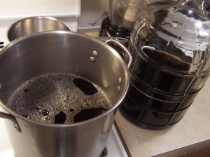 half of the tea in the stockpot, saving the other half for the next batch