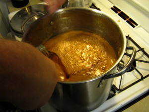 Adding my hot tea to the honey that has started to cool a bit. Very important to poor slowly, and keep stirring, to avoid bubbling and splashing.